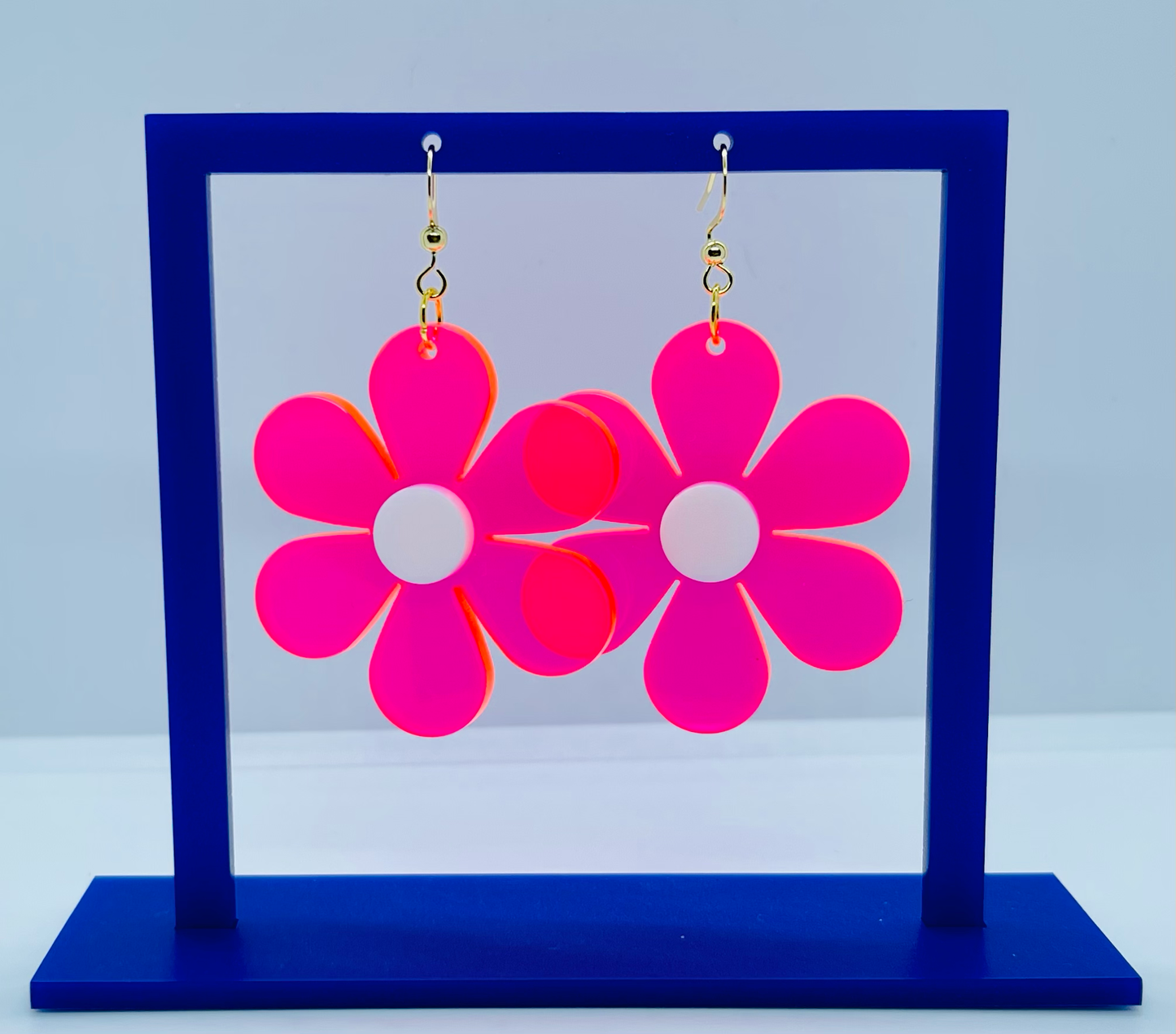 Fluorescent pink groovy flower acrylic earrings
